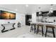 Modern kitchen with dark cabinets, white countertops, and breakfast bar at 1898 New Hampshire Ne Ave, St Petersburg, FL 33703