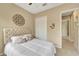 Bright bedroom with a queen-size bed and built-in closet at 7 Barge Ln, Placida, FL 33946