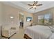 Spacious bedroom with large windows and ceiling fan at 7 Barge Ln, Placida, FL 33946