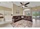 Living room with sectional sofa, high ceilings, and a view of the kitchen at 7 Barge Ln, Placida, FL 33946