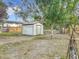 Large backyard with shed and windmill at 70 Horton Cir, Sarasota, FL 34232