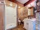 Clean bathroom with shower, toilet and vanity at 70 Horton Cir, Sarasota, FL 34232