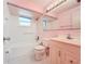 Bathroom with bathtub, toilet, and vanity at 70 Horton Cir, Sarasota, FL 34232