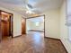 Spacious bedroom with tile flooring and ceiling fan at 70 Horton Cir, Sarasota, FL 34232