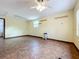 Empty bedroom with ceiling fan and window at 70 Horton Cir, Sarasota, FL 34232