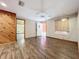 Living room featuring wood-look floors and ceiling fan at 70 Horton Cir, Sarasota, FL 34232