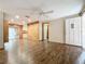 Living room with wood-look floors and exterior access at 70 Horton Cir, Sarasota, FL 34232