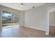 Bedroom with sliding glass doors to backyard at 2559 Comet Ln, North Port, FL 34286