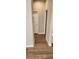 Bright hallway with wood-look flooring and access to other rooms at 2559 Comet Ln, North Port, FL 34286