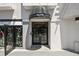 Modern building entrance with awning and signage at 1000 W Horatio St # 312, Tampa, FL 33606