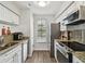 Brick courtyard with a fountain and lush landscaping at 1000 W Horatio St # 312, Tampa, FL 33606