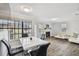 Open concept dining area with hardwood floors and living room views at 1000 W Horatio St # 312, Tampa, FL 33606