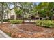 Attractive building entrance with brick signage and landscaping at 1000 W Horatio St # 312, Tampa, FL 33606
