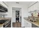 Kitchen features stainless steel appliances and granite countertops at 1000 W Horatio St # 312, Tampa, FL 33606