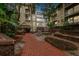 Granite countertops and white cabinets in this updated kitchen at 1000 W Horatio St # 312, Tampa, FL 33606