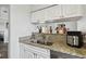 Modern kitchen with stainless steel appliances and granite counters at 1000 W Horatio St # 312, Tampa, FL 33606