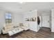 Living room with sectional sofa and built-in bar at 1000 W Horatio St # 312, Tampa, FL 33606