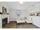 Living room with fireplace and hardwood floors at 1000 W Horatio St # 312, Tampa, FL 33606