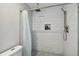 Clean and spacious shower with updated fixtures and pebble flooring at 1000 W Horatio St # 312, Tampa, FL 33606
