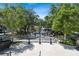 View of a town square with lush greenery and a central fountain at 1000 W Horatio St # 312, Tampa, FL 33606