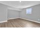 Well-lit bedroom with wood-look floors and a window with natural light at 3206 N 29Th St, Tampa, FL 33605
