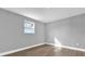Simple bedroom with wood-look floors and a window at 3206 N 29Th St, Tampa, FL 33605