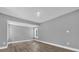 Spacious bedroom with gray walls and wood-look flooring at 3206 N 29Th St, Tampa, FL 33605