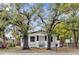 Charming bungalow with mature trees and a fenced yard at 3206 N 29Th St, Tampa, FL 33605