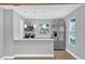 Updated kitchen featuring stainless steel appliances and an island at 3206 N 29Th St, Tampa, FL 33605