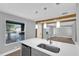 Modern kitchen with white quartz countertops and an open layout at 3206 N 29Th St, Tampa, FL 33605