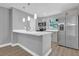 Modern kitchen with stainless steel appliances and an island at 3206 N 29Th St, Tampa, FL 33605
