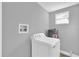 Laundry room with washer, dryer, and storage at 3206 N 29Th St, Tampa, FL 33605