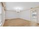 Bright dining room with hardwood floors and chandelier at 1001 Edgemont Pl, Brandon, FL 33511