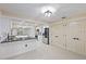 Modern kitchen with white cabinets and granite counters at 1001 Edgemont Pl, Brandon, FL 33511