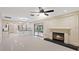 Living room with fireplace and view of kitchen at 1001 Edgemont Pl, Brandon, FL 33511