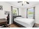 Bright bedroom with hardwood floors and ample natural light at 1621 S Jefferson Ave, Clearwater, FL 33756