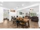 Farmhouse dining area with a rustic wooden table and black metal chairs at 1621 S Jefferson Ave, Clearwater, FL 33756