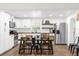 Bright kitchen featuring white shaker cabinets, stainless steel appliances, and a large island at 1621 S Jefferson Ave, Clearwater, FL 33756