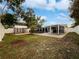 Private backyard oasis with a sparkling pool and storage shed at 5339 Brookmeade Dr, Sarasota, FL 34232