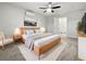 Spacious primary bedroom with large bed and en-suite bathroom at 5339 Brookmeade Dr, Sarasota, FL 34232