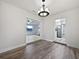 Dining room with views into the living room and kitchen at 5339 Brookmeade Dr, Sarasota, FL 34232