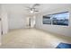 Spacious living room with tile flooring and large windows at 5339 Brookmeade Dr, Sarasota, FL 34232