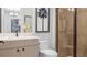 Modern bathroom with a glass shower and light wood vanity at 14517 Coastal Woodland Ln, Parrish, FL 34219