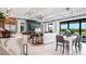 Open floor plan Gathering room with fireplace and kitchen views at 14517 Coastal Woodland Ln, Parrish, FL 34219