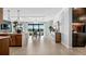 Open concept kitchen with island and views to dining and Gathering room at 14517 Coastal Woodland Ln, Parrish, FL 34219