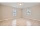 Bright bedroom with tile flooring and ample natural light at 11606 Nature Trl, Port Richey, FL 34668