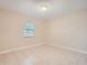 Spacious bedroom with tile flooring and neutral walls at 11606 Nature Trl, Port Richey, FL 34668