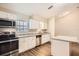 Modern kitchen featuring stainless steel appliances and granite countertops at 11606 Nature Trl, Port Richey, FL 34668