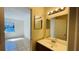 Bathroom vanity with sink and mirror at 5504 Pokeweed Ct # 154, Tampa, FL 33617