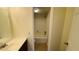 Bathroom with tub, vanity, and mirror at 5504 Pokeweed Ct # 154, Tampa, FL 33617